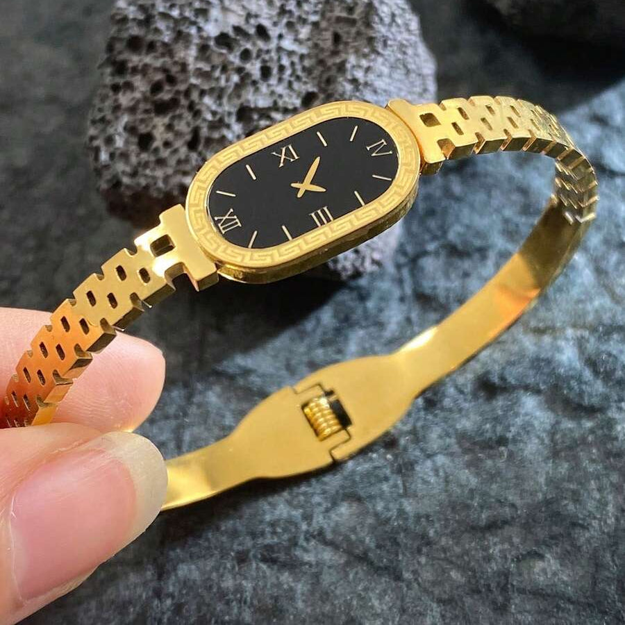 vintage-style gold-tone watch bangle