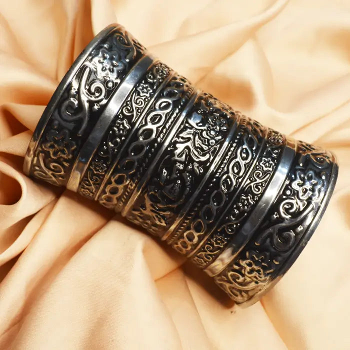 A Set of Six Wide, Antique-Style Oxidized Metal Cuff Bracelets
