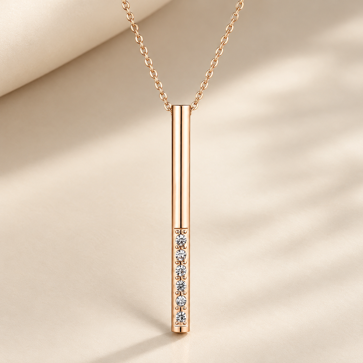 Rose gold-toned vertical bar pendant necklace