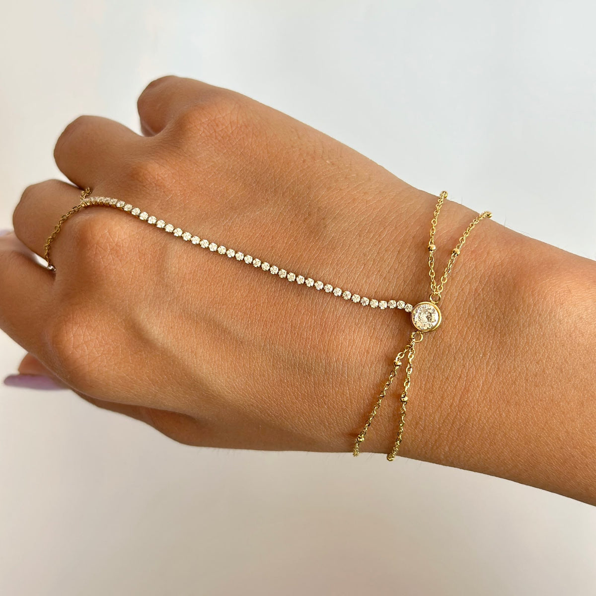 Gouden hand chain armband
