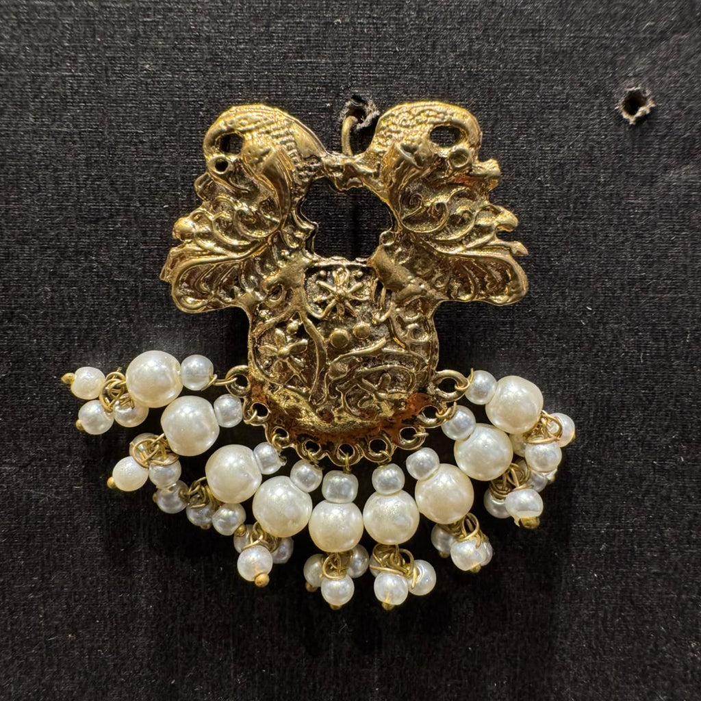 Floral Motifs Paired With Dangling White Pearl