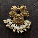 Floral Motifs Paired With Dangling White Pearl