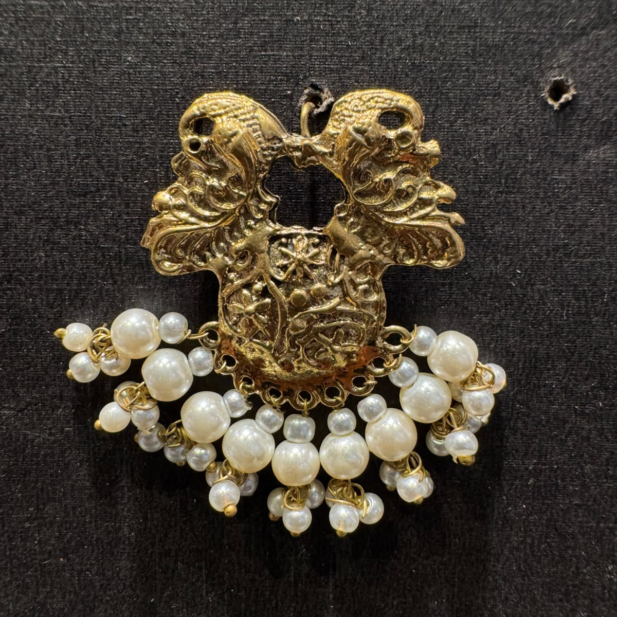 Floral Motifs Paired With Dangling White Pearl