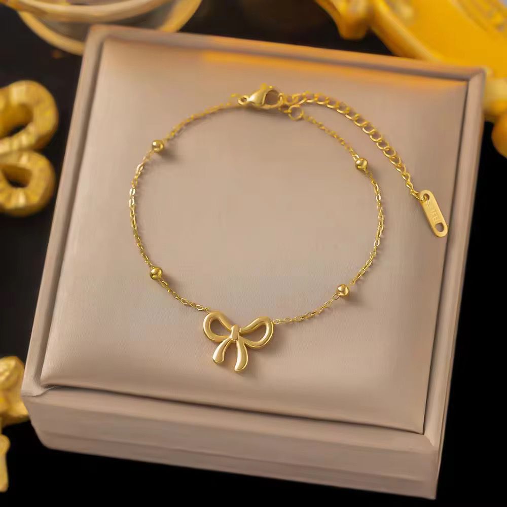 Delicate Ribbon Bow Charm Bracelet