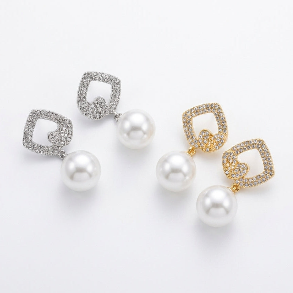 Geometric Drop Earrings Featuring A Hanging White Pearl