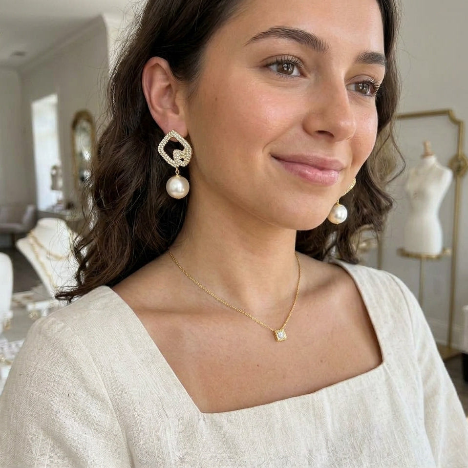 Geometric Drop Earrings Featuring A Hanging White Pearl