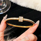 stainless steel rhinestone-studded bangle bracelet
